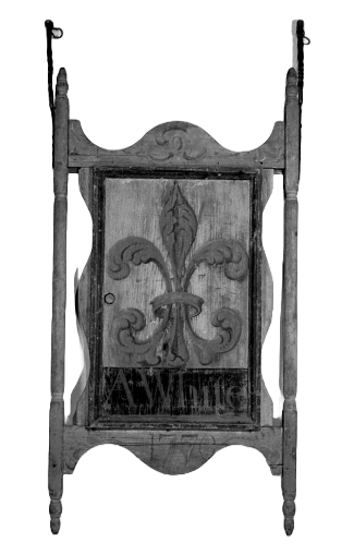 Carved and painted wooden tavern sign with a fleur-de-lis, framed for hanging.